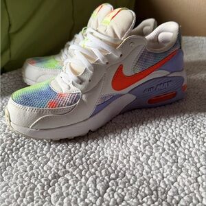 Nike Womens White Sneakers with Orange Swoosh and Pastel Accents